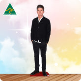 Cardboard cutout of a man in a black outfit with 'Australian Made' logo on a colorful background